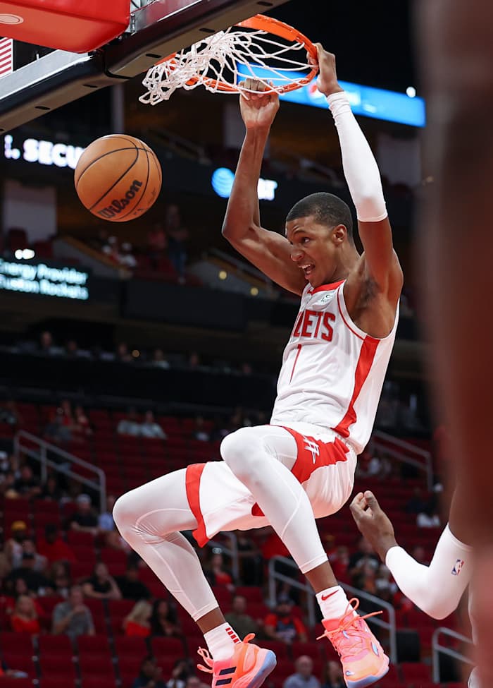 Oct 2, 2022; Houston, Texas, USA; Houston Rockets forward Jabari Smith Jr. (1) dunks the ball during the first quarter against the San Antonio Spurs at Toyota Center. Mandatory Credit: Troy Taormina-USA TODAY Sports